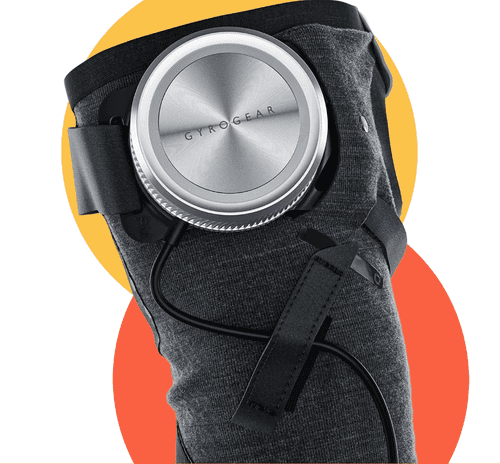 A close-up photo of the top of the hand and wrist of the GyroGlove. Behind the glove is a yellow circle and an orange circle.